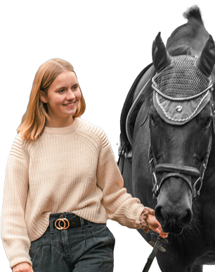 woman walking with a horse